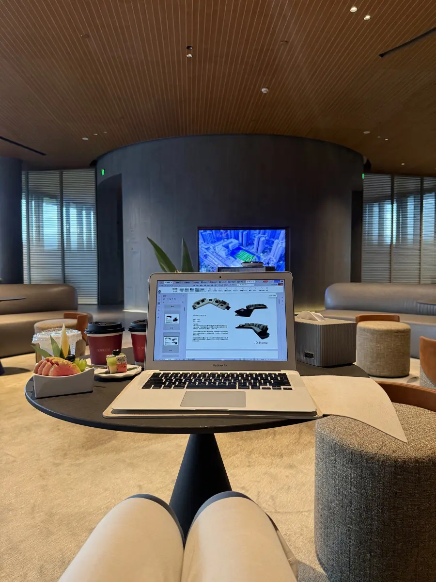 Laptop set up for a remote factory tour at the Guangzhou meeting space